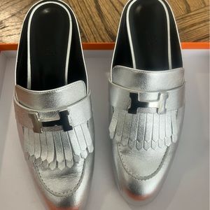 Hermes size 37.5 Rivoli mules in silver. Worn once. Plastic still on hardware